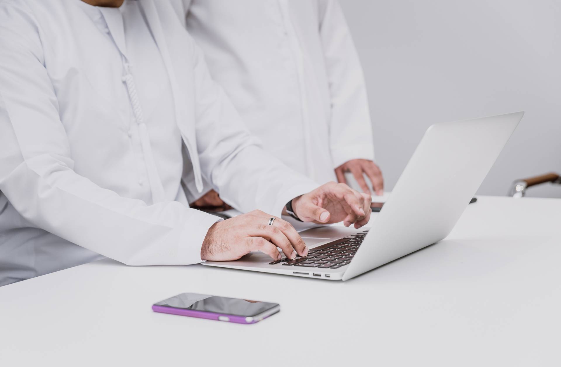 corporate governance in saudi arabia - business professional working on a laptop - khalaf bandar law firm